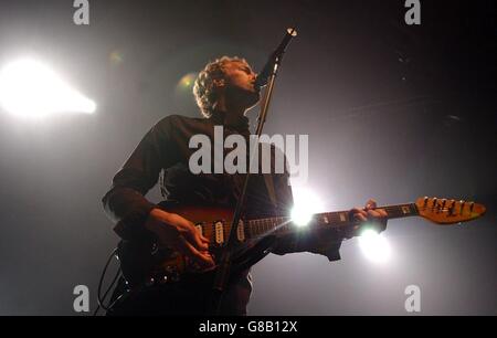 Lead singer Chris Martin from Coldplay performs onstage. Stock Photo