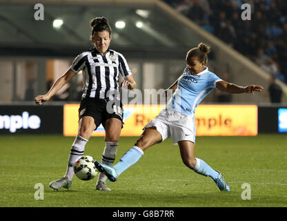 Manchester City Ladies' Nikita Parris (right) and Notts County Ladies' Leanne Chrichton battle for the ball during the Women's Super League match at the Academy Stadium, Manchester.