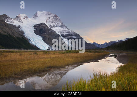 Mount Robson, highest mountain in the Canadian Rockies, elevation 3,954 m (12,972 ft), seen from Berg Lake, Mount Robson Provinc Stock Photo