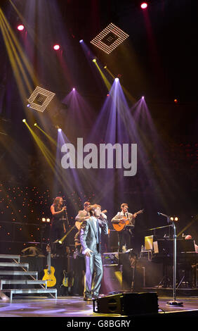 Sir Cliff Richard performs in concert at the Royal Albert Hall in central London, as part of his 75th birthday tour, after celebrating his birthday two days ago on the 14th October. Stock Photo