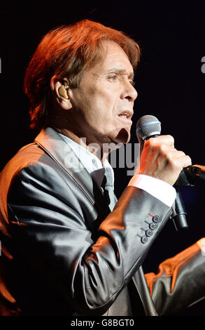 Sir Cliff Richard performs in concert at the Royal Albert Hall in central London, as part of his 75th birthday tour, after celebrating his birthday two days ago on the 14th October. Stock Photo