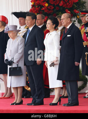 (Left-right) Queen Elizabeth II, Chinese President Xi Jinping, Madame Peng Liyuan and the Duke of Edinburgh at Horse Guards Parade, London, during the ceremonial welcome for the president on the first day of his state visit to the UK. Stock Photo