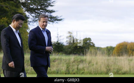 Prime Minister David Cameron walks with Chinese President Xi Jinping in the gardens of his Buckinghamshire country retreat Chequers. Stock Photo