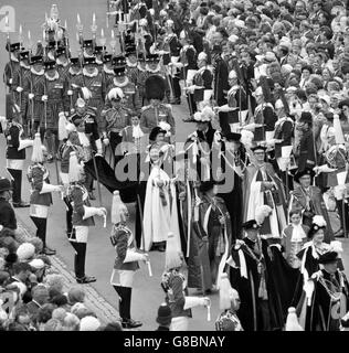 Knights of the Most Noble Order of the Garter, one of the oldest Orders of Christian Chivalry, in procession for the Order of the Garter Service at St George's Chapel in Windsor. In foreground right is Earl Mountbatten of Burma, followed by the Queen Mother, the Duke of Norfolk, Hon Sir George Bellew (l), Sir George Mills (Black rod, right), Dean of Windsor (r), Margquess of Salisbury (r), Sir Anthony Wagnet (Garter, centre), Lord Bishop of Winchester (l), Queen Elizabeth II and Duke of Edinburgh, the Pages of Honour, Christoper Tennant and Richard Ford and Major-General Edmund Hakewell Smith. Stock Photo