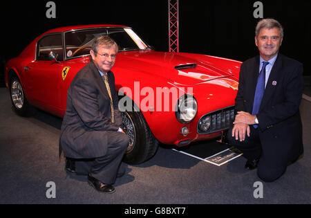 (left to right) Charles Denton, godson and executor to the estate of the late Richard Colton with RNLI Chief Executive Paul Boissier, next to a 1960 Ferrari 250 GT short-wheelbase (SWB) Berlinetta chassis 1995 GT, of which just 167 were made with a mere ten being supplied new to the UK market, one of the star lots with no reserve, on display prior to the H&H Classics, classic cars and motorcycles sale, at the Imperial War Museum, Duxford, one of two of the rarest and most sought-after Ferraris ever made which are being sold to raise funds for the Royal National Lifeboat Institution (RNLI). Stock Photo