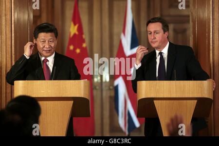 China's President Xi Jinping and Prime Minister David Cameron attend a joint press conference in 10 Downing Street, in central London on the second day of his state visit to the UK. Stock Photo