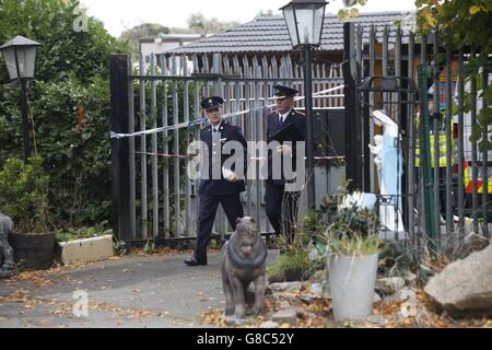 Emergency services at a halting site for travellers in Carrickmines, south Dublin, where ten people from two families, including a mother, father and a five-month-old baby, have been killed in a fire. Stock Photo