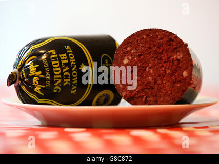 A Stornoway Black Pudding from Charles Macleod butchers in Stornoway. Black Pudding could soon be joined by other Scottish products such as tartan and Harris Tweed in having specific European protection. The Geographical Indicator (GI) status ensures consumers know they are buying the real deal due to legal protection against imitation within the EU. MEPs recently voted overwhelmingly in favour of extending geographical protection to non-agricultural products. PRESS ASSOCIATION Photo. Picture date:Wednesday 14th October ,2015. Photo credit should read: Andrew Milligan/PA Wire. Stock Photo