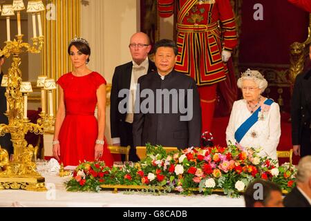 Chinese President Xi Jinping with the Duchess of Cambridge (and Queen Elizabeth II at a state banquet at Buckingham Palace, London, during the first day of his state visit to the UK. Stock Photo