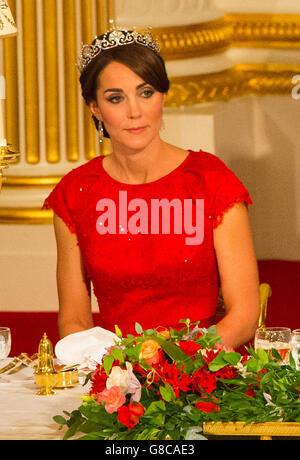 ALTERNATE CROP The Duchess of Cambridge as Queen Elizabeth II speaks at a state banquet at Buckingham Palace, London, during the first day of his state visit to the UK. Stock Photo