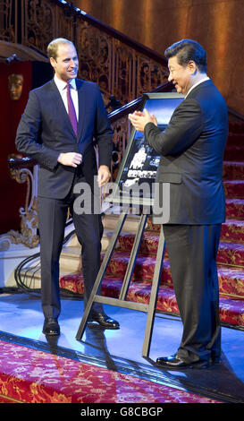 The Duke of Cambridge with the President Xi Jinping of The People's Republic of China as they visit a creative industry event at Lancaster House, London on day two of the President's state visit to the UK. Stock Photo
