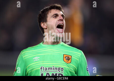 Hull City goalkeeper Eldin Jakupovic celebrates during the penalty shoot out following the Capital One Cup, Fourth Round match at the KC Stadium, Hull. Stock Photo