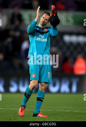 Arsenal goalkeeper Petr Cech applauds the fans after the Barclays Premier League match at the Liberty Stadium, Swansea. Stock Photo