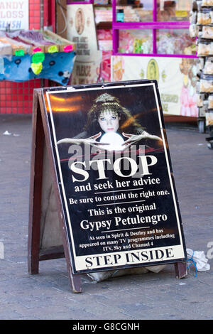 Gypsy Lee Palmist sign in gold lettering, in Bonny Street, Blackpool, UK Stock Photo