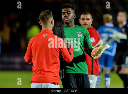 Coventry City goalkeeper Reice Charles-Cook (right) shakes hands with Adam Armstrong after the game. Stock Photo
