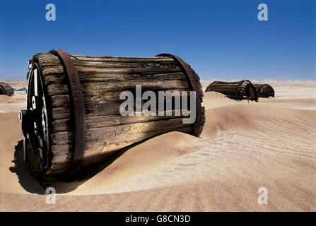 Old diamond industry water barrels, Namib Desert, Namibia. Stock Photo