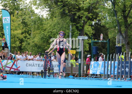 Team GB elite triathlete Lucy Hall enters transition after the bike leg of the 2016 ETU Sprint Championships in Chateauroux. Stock Photo