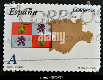 SPAIN - CIRCA 2011: A stamp printed in spain shows flag and map of the autonomous community of Castilla y Leon, circa 2011 Stock Photo