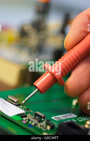 Soldering of chips on the printed circuit board Stock Photo