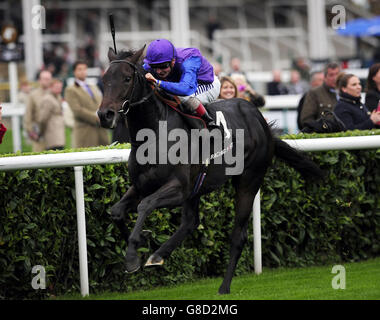 Jockey Andrea Atzeni and Marcel win the Racing Post Trophy during day two of the Racing Post Trophy weekend at Doncaster Racecourse. Stock Photo