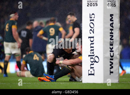 Rugby Union - Rugby World Cup 2015 - Semi Final - South Africa v New Zealand - Twickenham Stadium. New Zealand's Sonny Bill Williams consoles South Africa's Jesse Kriel after the game Stock Photo