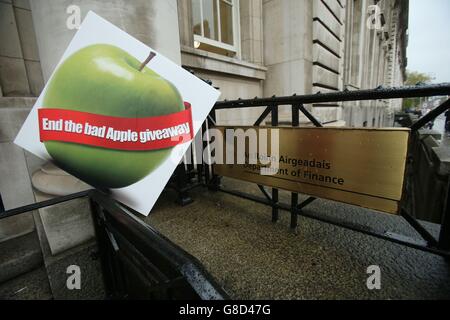 Members of the Debt & Development Coalition Ireland holding a protest outside Department of Finance in Dublin where they are calling for the Public Accounts Committee to investigate the tax rulings system, by which they say Revenue gives away billions in revenues to Apple and other multinational corporations. Stock Photo