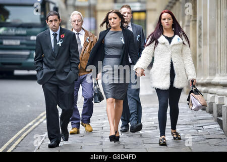 Friends and family of Becky Watts, including her grandfather, John Galsworthy (second left), wear blue ribbons in support of Becky Watts as they arrive at Bristol Crown Court on the first day of Nathan Matthews defence case in the murder trial. Stock Photo