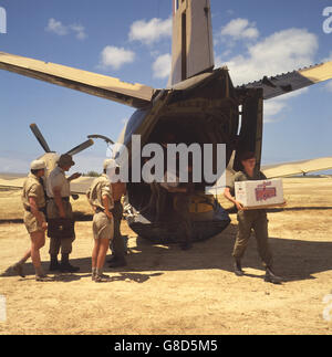 Stores arriving off the back of an RAF plane at the airstrip on Aguilla. British troops, as well as British Policeman, were sent to island following political unrest. The Island was bidding for independence from Great Britain. Stock Photo