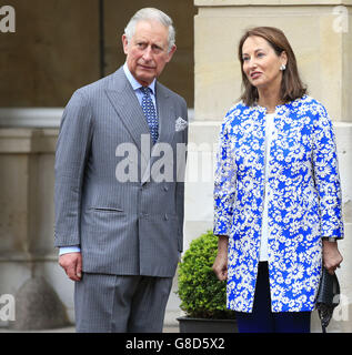 The Prince of Wales and Segolene Royal (right) arrive at a meeting on forests and climate change at Lancaster House in London, ahead of the upcoming Cop21 United Nations Climate Change Conference in Paris. Stock Photo