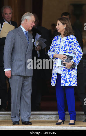 The Prince of Wales and Segolene Royal (right) leave a meeting on forests and climate change at Lancaster House in London, ahead of the upcoming Cop21 United Nations Climate Change Conference in Paris. Stock Photo