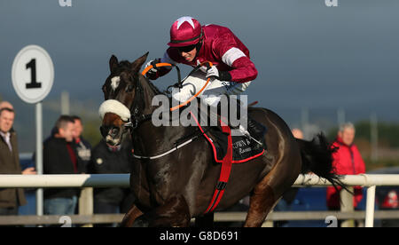 Cogryhill ridden by Bryan Cooper wins Eventsec Maiden Hurdle during day one of the 2015 Northern Ireland Festival of Racing at Down Royal Racecourse, Lisburn, County Down. Stock Photo