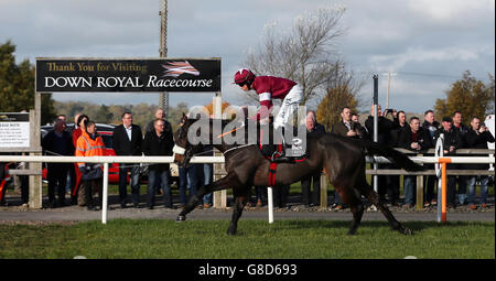 Cogryhill ridden by Bryan Cooper wins Eventsec Maiden Hurdle during day one of the 2015 Northern Ireland Festival of Racing at Down Royal Racecourse, Lisburn, County Down. Stock Photo