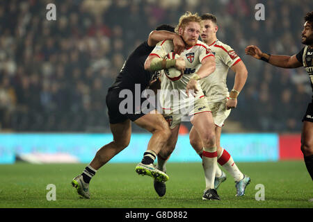 Rugby League - International Test Series - First Test - England v New Zealand - KC Stadium. England's James Graham bursts through during the International Test Series match at the KC Stadium, Hull. Stock Photo