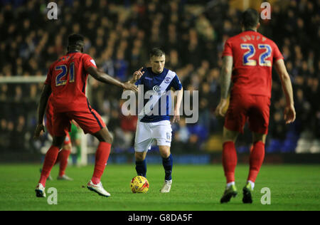 Birmingham City's Stephen Gleeson (centre) battles for the ball with Blackburn Rovers' Hope Akpan (left) and Shane Duffy during the Sky Bet Championship match at St Andrews, Birmingham. Stock Photo