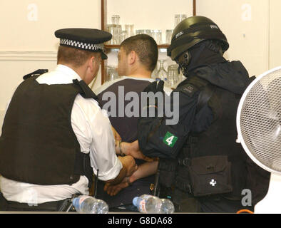 Armed Police raid on Turkish-Kurdish Cafe - North London Stock Photo