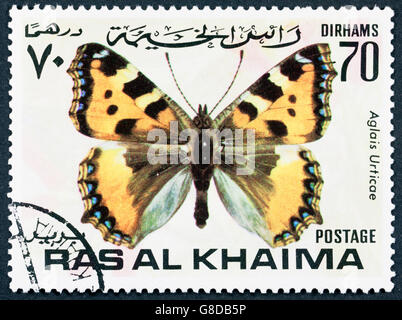GROOTEBROEK ,THE NETHERLANDS - MARCH 8,2016 : A stamp printed by Dubai, shows Tropical butterfly, Circa 1968 Stock Photo