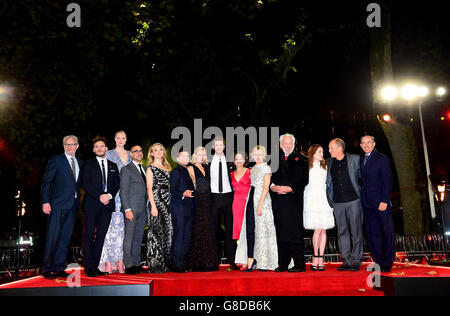 (left to right) Francis Lawrence, Sam Claflin, Gwendoline Christie, Stanley Tucci, Natalie Dormer, Josh Hutcherson, Jennifer Lawrence, Liam Hemsworth, Nina Jacobson, Elizabeth Banks, Donald Sutherland, Julianne Moore, Woody Harrelson and Jon Kilik attending the UK Premiere of The Hunger Games: Mockingjay, Part 2 at the ODEON Leicester Square, London. PRESS ASSOCIATION Photo. See PA story SHOWBIZ HungerGames. Picture date: Thursday November 5, 2015. Photo credit should read: Ian West/PA Wire Stock Photo