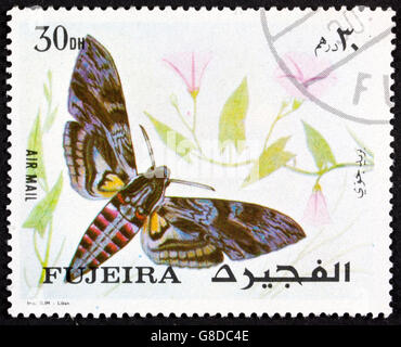 GROOTEBROEK ,THE NETHERLANDS - MARCH 20,2016 : Postage stamp from Fujairah or Fujeira ca. 1967 showing the colorful drawing of a Stock Photo
