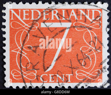 NETHERLANDS - CIRCA 1946: A stamp printed in the Netherlands showing it's value of 7 cent, circa 1946. Stock Photo