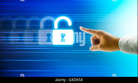 Hand pushing virtual security button on digital background Stock Photo