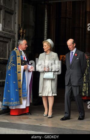 The Dean of Westminster, Reverend John Hall (left) talks to Princess Michael of Kent (centre) and the Duke of Kent as they leave Westminster Abbey in London following a service to commemorate the 600th Anniversary of the Battle of Agincourt. Stock Photo
