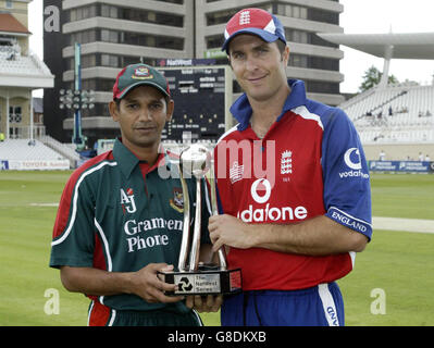 England's captain Michael Vaughan (R) holds the NatWest Series Trophy with Bangladesh's captain Habibul Bashar. Stock Photo