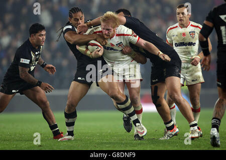 England's James Graham is held up during the International Test Series match at the KC Stadium, Hull. Stock Photo