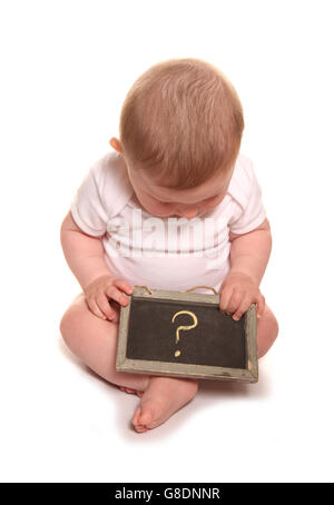 Baby starting to be inquisitive about everything cutout Stock Photo
