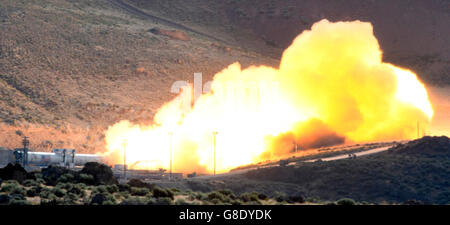 June 28, 2016. Promontory UT. Raw fire power is blasted into a hillside as ATK test fires a solid rocket booster motor that burns 6 tons of propellant each second with expanding gases and flames exiting the nozzle at speeds in excess of Mach 3 and temperatures reaching 3,700 degrees Fahrenheit Tuesday. Orbital ATK test fire happen at 9:05am MT time and NASA will use measurements from more than 530 data channels to evaluate motor performance, acoustics, motor vibrations, nozzle modifications, insulation upgrades. Photo by Gene Blevins/LA DailyNews/ZumaPress. (Credit Image: © Gene Blevins via Stock Photo