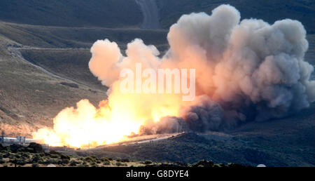 June 28, 2016. Promontory UT. Raw fire power is blasted into a hillside as ATK test fires a solid rocket booster motor that burns 6 tons of propellant each second with expanding gases and flames exiting the nozzle at speeds in excess of Mach 3 and temperatures reaching 3,700 degrees Fahrenheit Tuesday. Orbital ATK test fire happen at 9:05am MT time and NASA will use measurements from more than 530 data channels to evaluate motor performance, acoustics, motor vibrations, nozzle modifications, insulation upgrades. Photo by Gene Blevins/LA DailyNews/ZumaPress. (Credit Image: © Gene Blevins via Stock Photo