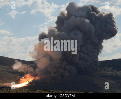 June 28, 2016. Promontory UT. Raw fire power is blasted into a hillside as ATK test fires a solid rocket booster motor that burns 6 tons of propellant each second with expanding gases and flames exiting the nozzle at speeds in excess of Mach 3 and temperatures reaching 3,700 degrees Fahrenheit Tuesday. Orbital ATK test fire happen at 9:05am MT time and NASA will use measurements from more than 530 data channels to evaluate motor performance, acoustics, motor vibrations, nozzle modifications, insulation upgrades. Photo by Gene Blevins/LA DailyNews/ZumaPress. (Credit Image: © Gene Blevins via Stock Photo