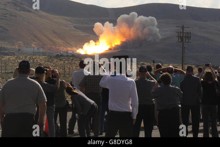 June 28, 2016. Promontory UT. Raw fire power is blasted into a hillside as ATK test fires a solid rocket booster motor that burns 6 tons of propellant each second with expanding gases and flames exiting the nozzle at speeds in excess of Mach 3 and temperatures reaching 3,700 degrees Fahrenheit Tuesday. Orbital ATK test fire happen at 9:05am MT time and NASA will use measurements from more than 530 data channels to evaluate motor performance, acoustics, motor vibrations, nozzle modifications, insulation upgrades. Photo by Gene Blevins/LA DailyNews/ZumaPress. (Credit Image: © Gene Blevins via Stock Photo