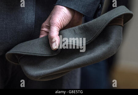 Frankfurt, Germany. 29th June, 2016. German artist Georg Baselitz holds his hat in the exhibition 'Georg Baselitz. The Heroes' at the Staedel art museum in Frankfurt am Main, Germany, 29 June 2016. The monographic special exhibition features some 70 works by the painter. Credit:  dpa picture alliance/Alamy Live News Stock Photo