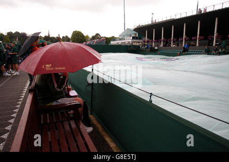 29.06.2016. All England Lawn Tennis and Croquet Club, London, England. The Wimbledon Tennis Championships Day Three. A general view of Court 4 at the All-England Club, Wimbledon. Light rain has delayed the start of play today, the covers are still on the outside courts but the roof has been closed on Centre Court. Stock Photo